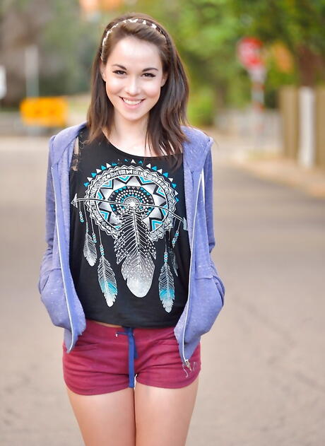 Svelte american dark-haired teen Emily Grey in sexy shorts exhibits tiny tits and sexy ass outdoor